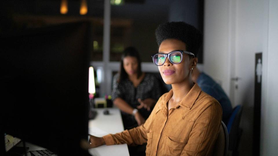 Business Intelligence professional working on computer