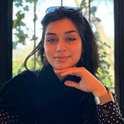 A headshot of Sarah Qanbar.